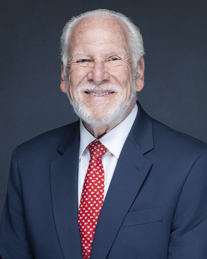 Executive headshot of Dr. Geoffrey N. James, FemCare Ob-Gyn, photographed on location in Miami