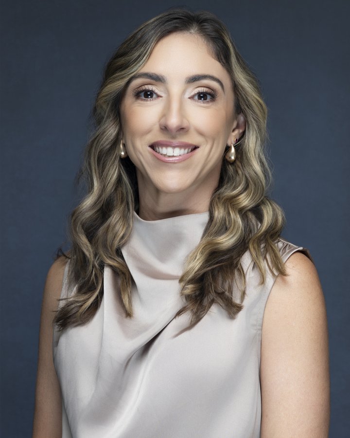 Executive headshot of Dr. Jennifer Schell, FemCare Ob-Gyn, photographed on location in Miami